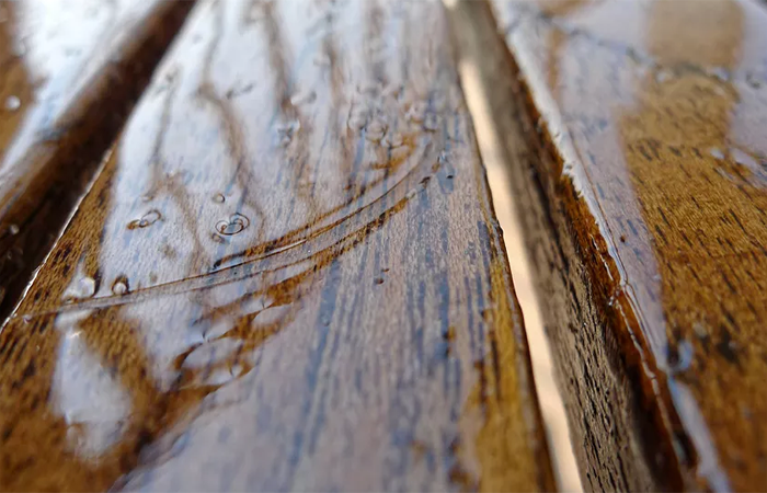 when water soaks into wood floor
